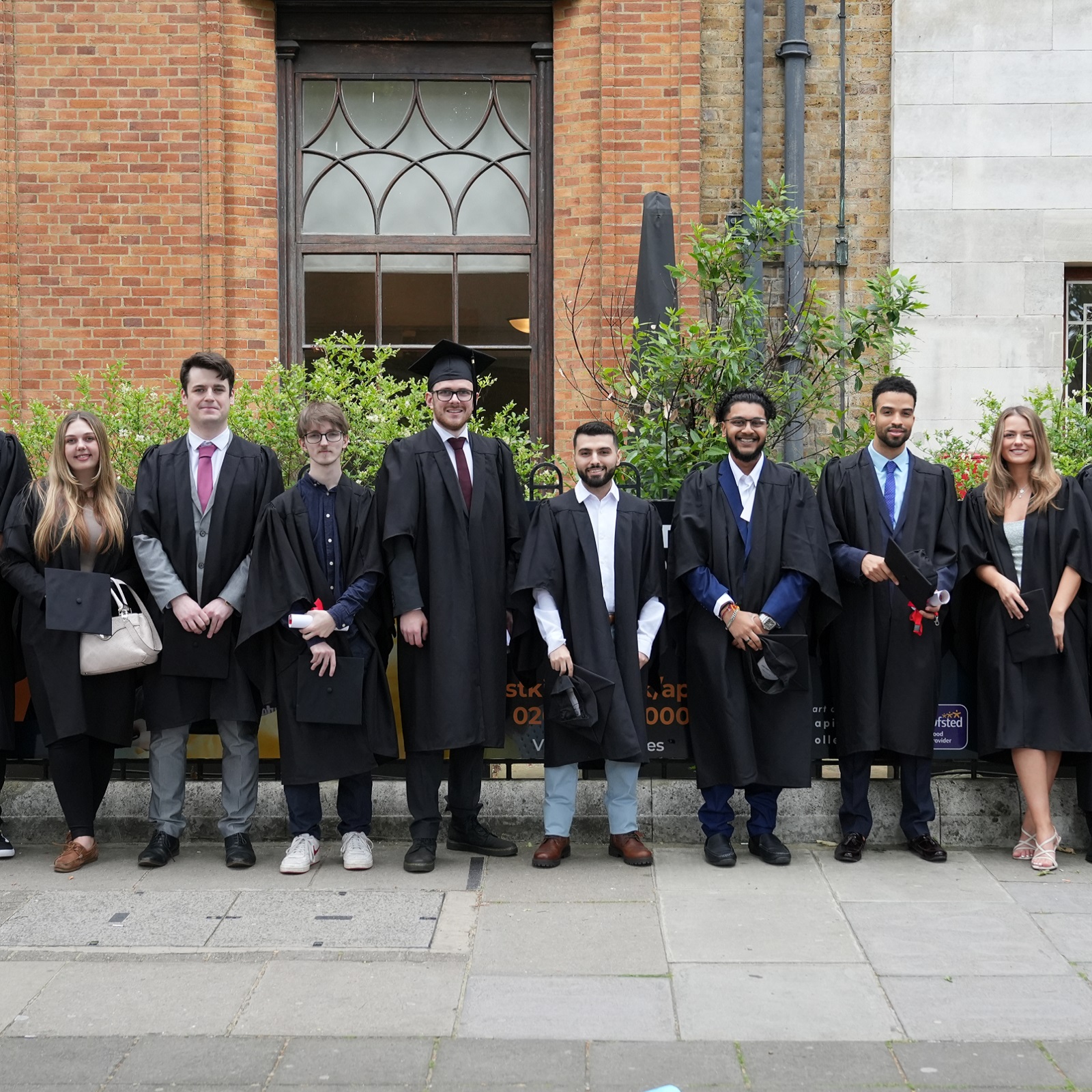 A Howdens Apprentice Graduation photo, featuring multiple apprentices.